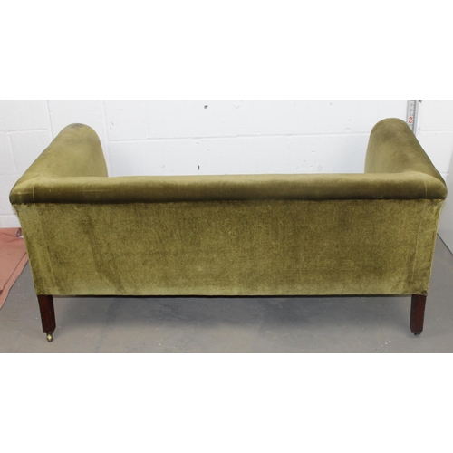 136 - In the manner of Howard & Sons - An unusual Victorian 2 seater sofa with green velvet upholstery sta... 