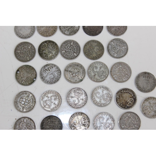 1371 - 32 full & half silver 3d coins