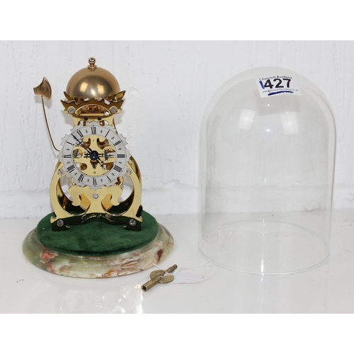 1427 - An 20th century English made brass skeleton clock under glass dome by Thwaites & Reed on onyx base -... 