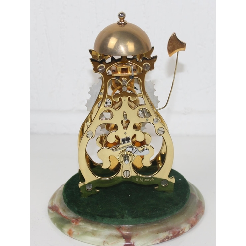 1427 - An 20th century English made brass skeleton clock under glass dome by Thwaites & Reed on onyx base -... 