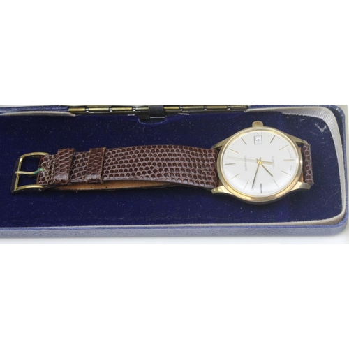 1437 - A 9ct gold cased gentleman's watch by Garrard - model 285W with original box and paperwork - 31.9g g... 