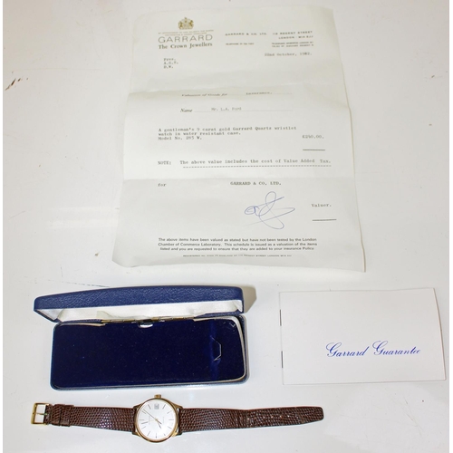 1437 - A 9ct gold cased gentleman's watch by Garrard - model 285W with original box and paperwork - 31.9g g... 