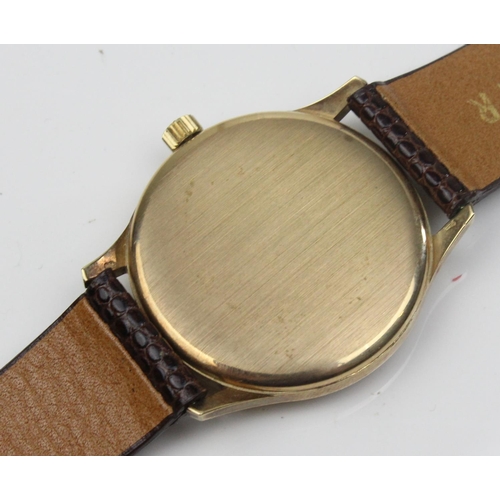 1437 - A 9ct gold cased gentleman's watch by Garrard - model 285W with original box and paperwork - 31.9g g... 