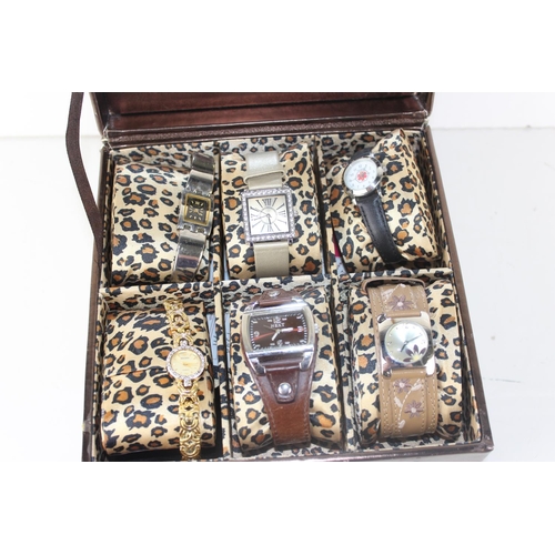 1445 - Watch display box and 6 watches