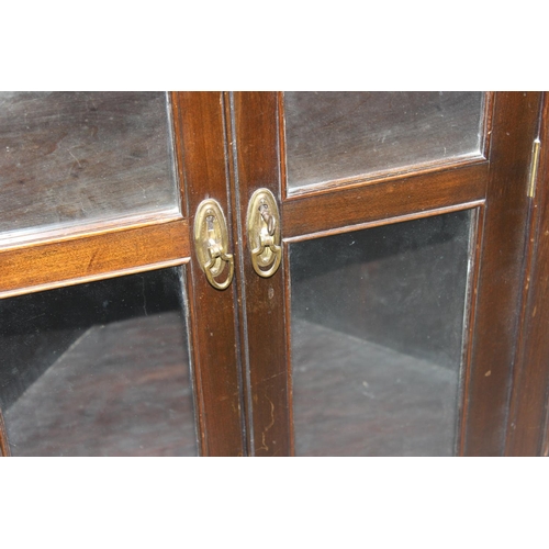 145 - Antique corner cupboard with glazed doors