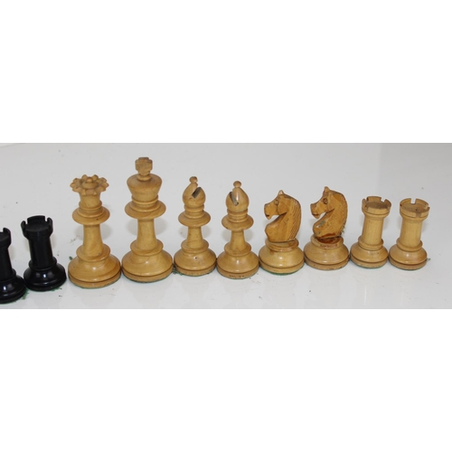 1490 - 2 wooden chess sets in box and one other plastic set