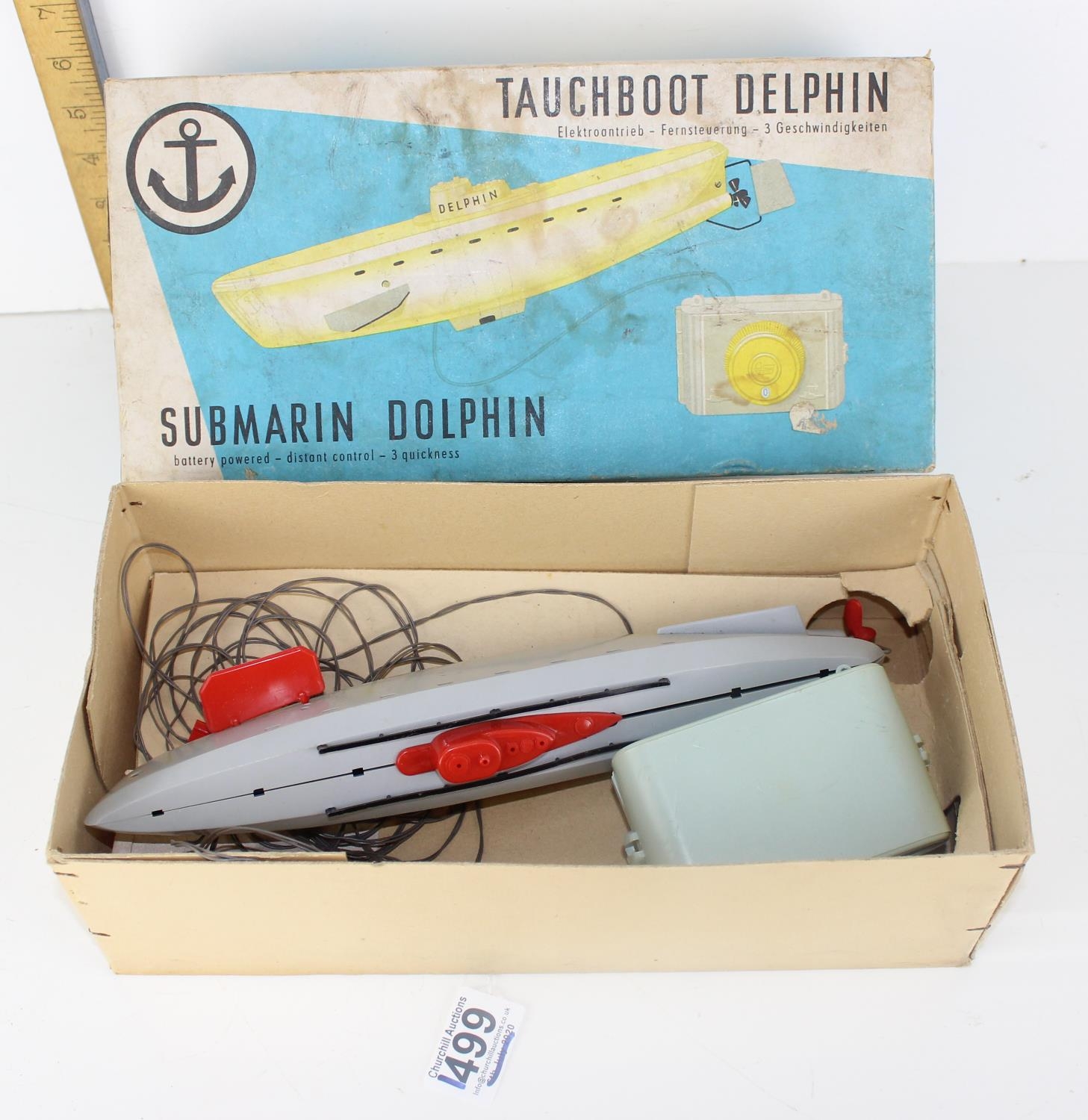 A vintage Tauchboot Delphin Submarin Dolphin toy submarine in box