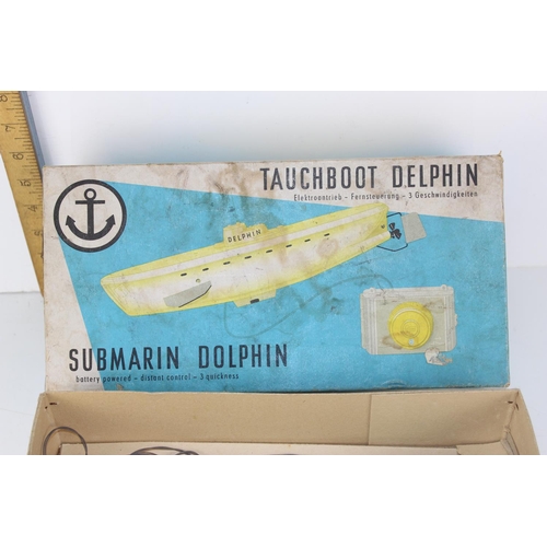 A vintage Tauchboot Delphin Submarin Dolphin toy submarine in box