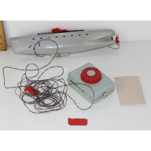 A vintage Tauchboot Delphin Submarin Dolphin toy submarine in box