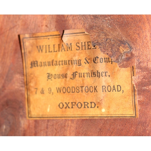 153 - An Edwardian octagonal side table with Oxford makers label under