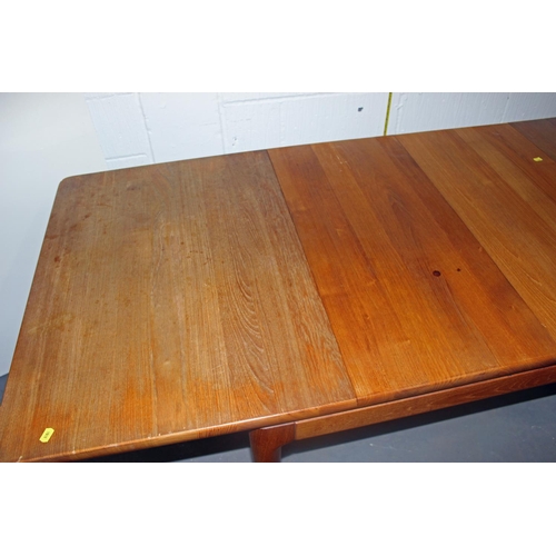 16 - A Danish made by Glostrup Teak extending dining table with 2 extra leaves and a set of 6 dining chai... 