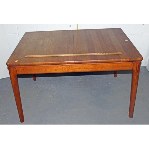 16 - A Danish made by Glostrup Teak extending dining table with 2 extra leaves and a set of 6 dining chai... 