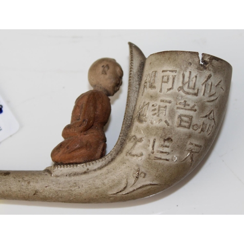 1676 - 2 unusual antique clay pipes - Merry Xmas large bowl with Baccus face and a Chinese designed one wit... 