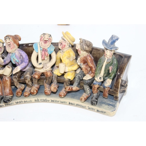 1688 - Will Young Devon pottery - Widdecombe Fair pottery group the figures seated on a long bench with the... 