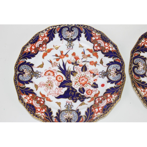 1804 - A set of 3 19th century plates in the Imari palette - impressed Derby mark verso