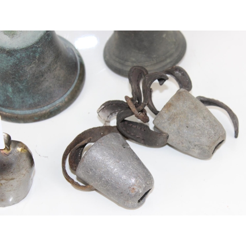 1854 - Qty of vintage metal bells to inc a cow bell on leather strap