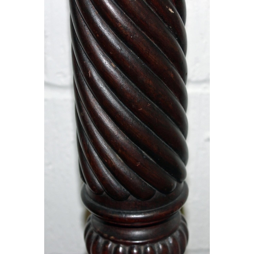 22 - A Victorian carved Mahogany pedestal standing on Ball & Claw feet