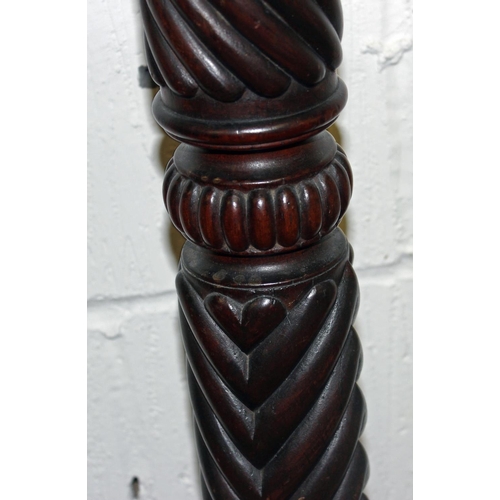 22 - A Victorian carved Mahogany pedestal standing on Ball & Claw feet