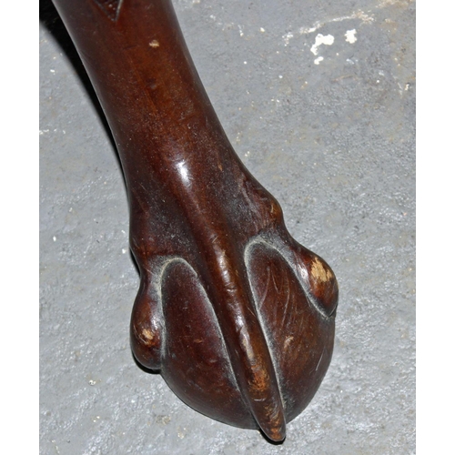 22 - A Victorian carved Mahogany pedestal standing on Ball & Claw feet