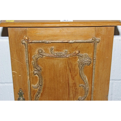 27 - A Victorian pine pot cupboard with Rococo design