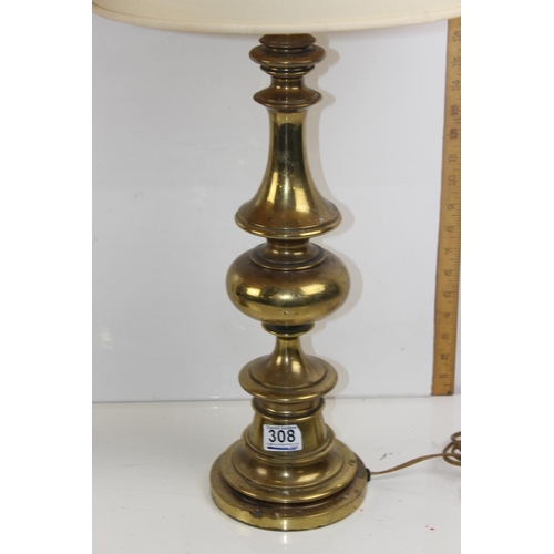 308 - An extremely large pair of turned brass lamps