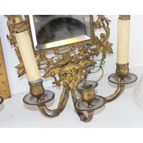 333 - A pair of 19th century gilded cast brass girandole wall mirrors marked verso JJ 30, the rectangular ... 