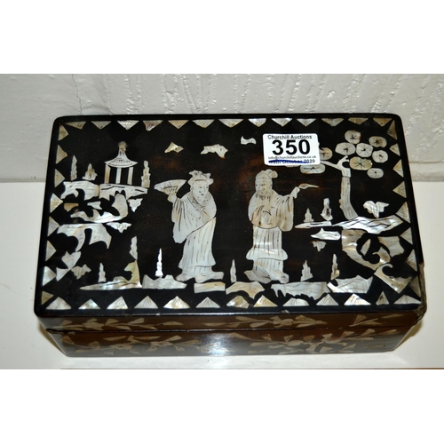 350 - An Oriental lacquer box with mother of pearl inlay