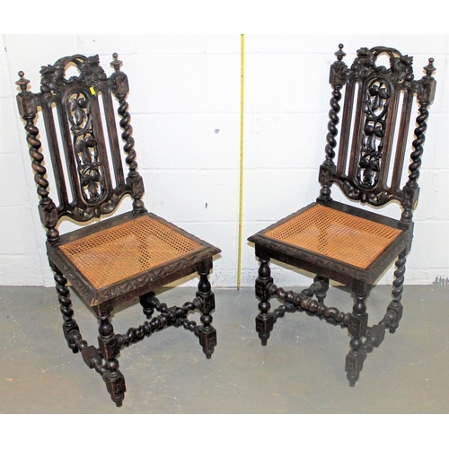 37 - A pair of Jacobean style hall chairs with cane seats