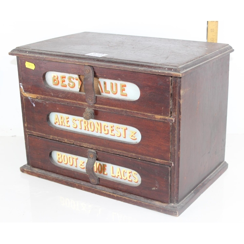 373 - An early 20th century shop display/ storage box with painted glass advertising for boot & shoe laces