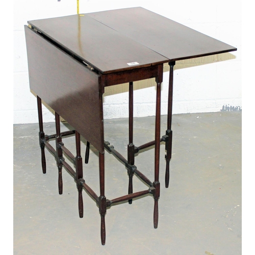 38 - In the manner of E.W. Godwin - An Aesthetic Movement Sutherland table standing on 8 thin turned supp... 