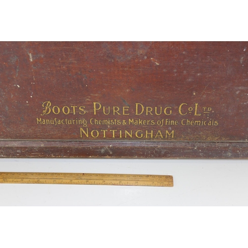 380 - A Vintage wooden Boots first aid box dated 1937