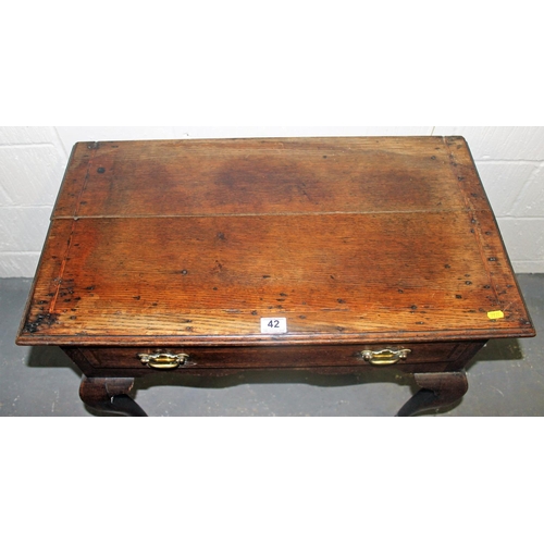 42 - An 18th century Oak lowboy table with drawer