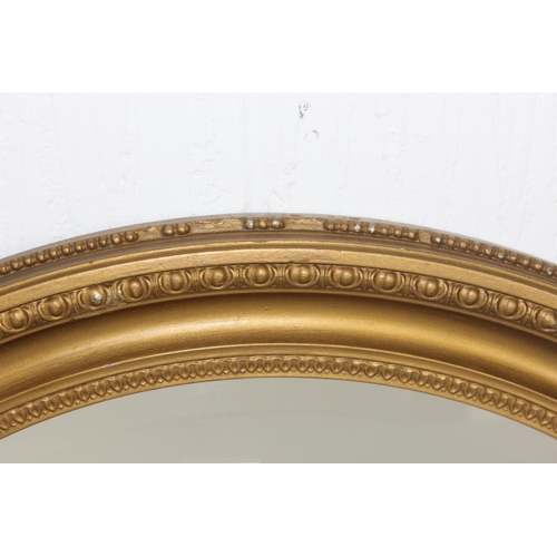 426 - Oval gilt framed mirror