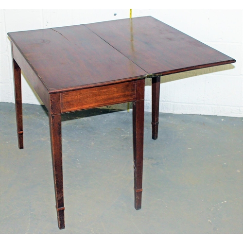 45 - A Victorian mahogany fold over tea table