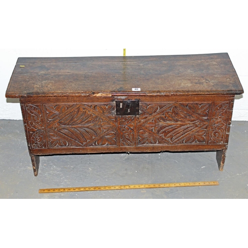 46 - A 17th/18th century small Oak coffer with carved details and iron fittings