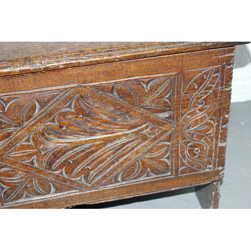 46 - A 17th/18th century small Oak coffer with carved details and iron fittings