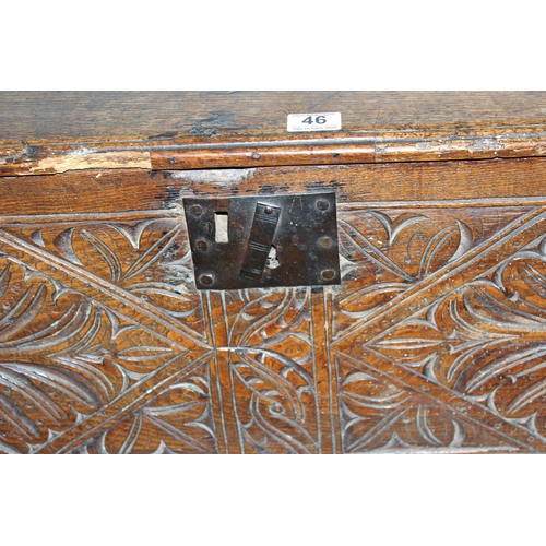 46 - A 17th/18th century small Oak coffer with carved details and iron fittings