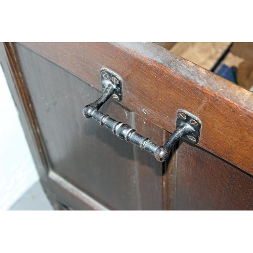 47 - A 17th/18th century larger Oak coffer with carved details and iron fittings