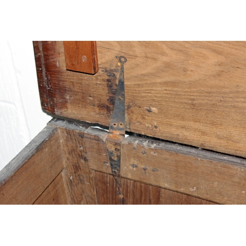 47 - A 17th/18th century larger Oak coffer with carved details and iron fittings