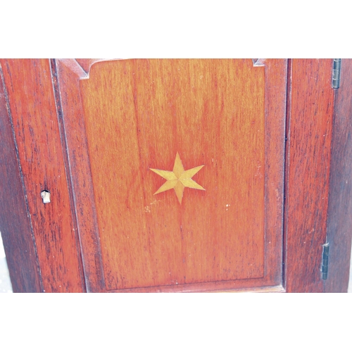 49 - A Georgian Oak corner cupboard with star inlay