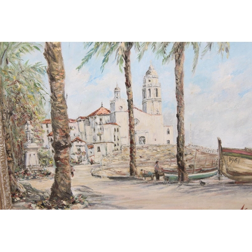 501 - J Enstone (20th Century) - An oil on board of Sitges in Spain signed lower right and dated 1961