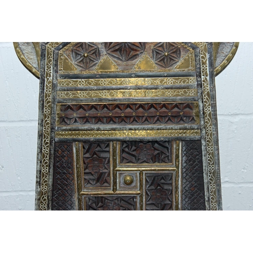 52 - An antique traditional Indian / Punjabi Pidha marriage chair of low form with carved and brass detai... 