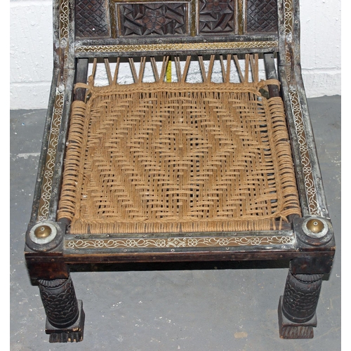 52 - An antique traditional Indian / Punjabi Pidha marriage chair of low form with carved and brass detai... 