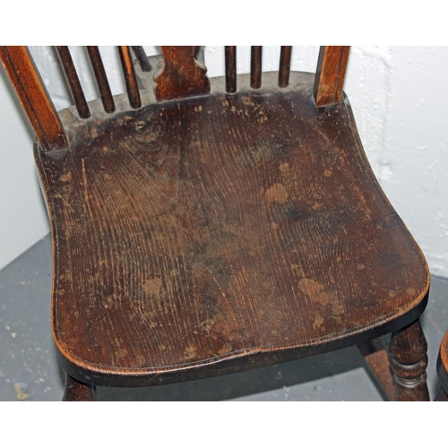 56 - A set of 4 early 20th century wheel back chairs with Elm seats