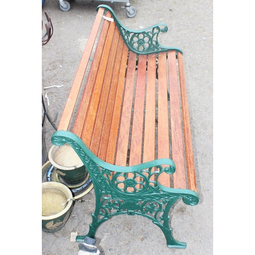 561 - Garden bench with cast iron ends and wooden slats