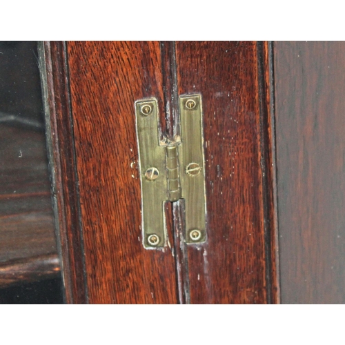 63 - A Georgian glazed Oak corner cabinet