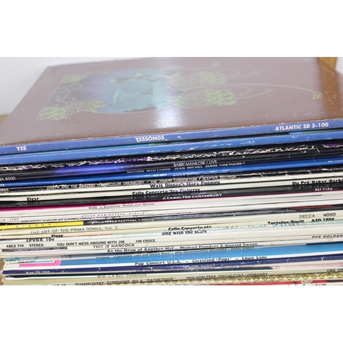 703 - A large qty of vinyl records to inc Queen