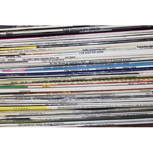 703 - A large qty of vinyl records to inc Queen