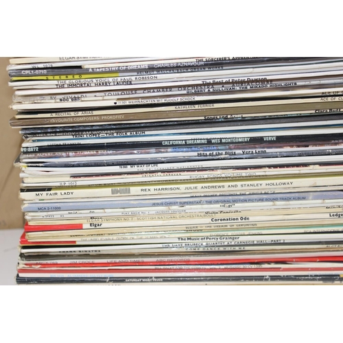 703 - A large qty of vinyl records to inc Queen