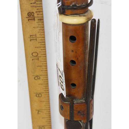 709 - An antique boxwood clarinet - seemingly unmarked